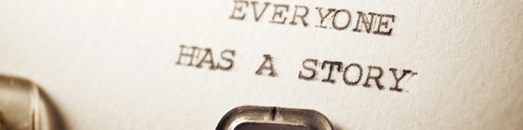 Typewriter with a letter stating 'everyone has a story', emphasizing the personal journey behind the 'why consulting' question.